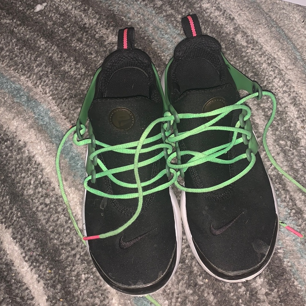 Black kids Nike sneakers gently used
